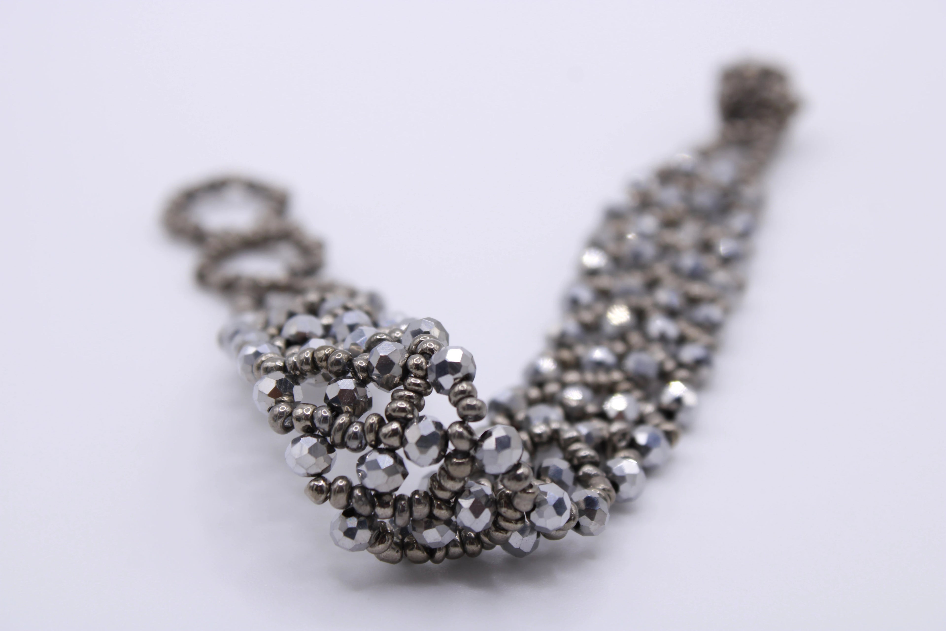 Bracciale Astra – Bracciale con cristalli intrecciati Surya