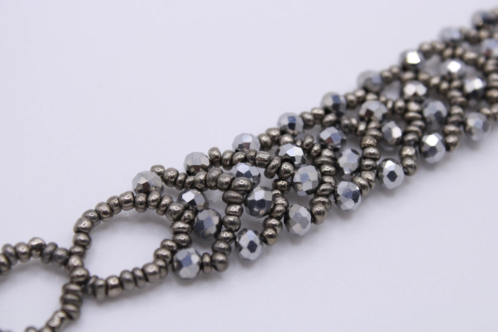 Bracciale Astra – Bracciale con cristalli intrecciati Surya