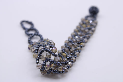 Bracciale Astra – Bracciale con cristalli intrecciati Surya