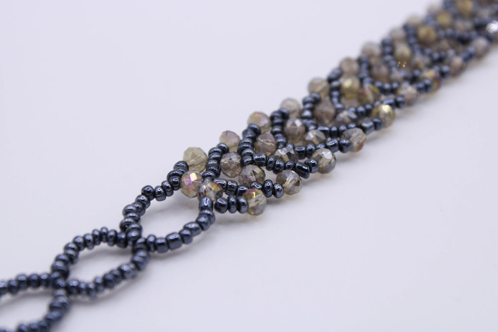 Bracciale Astra – Bracciale con cristalli intrecciati Surya
