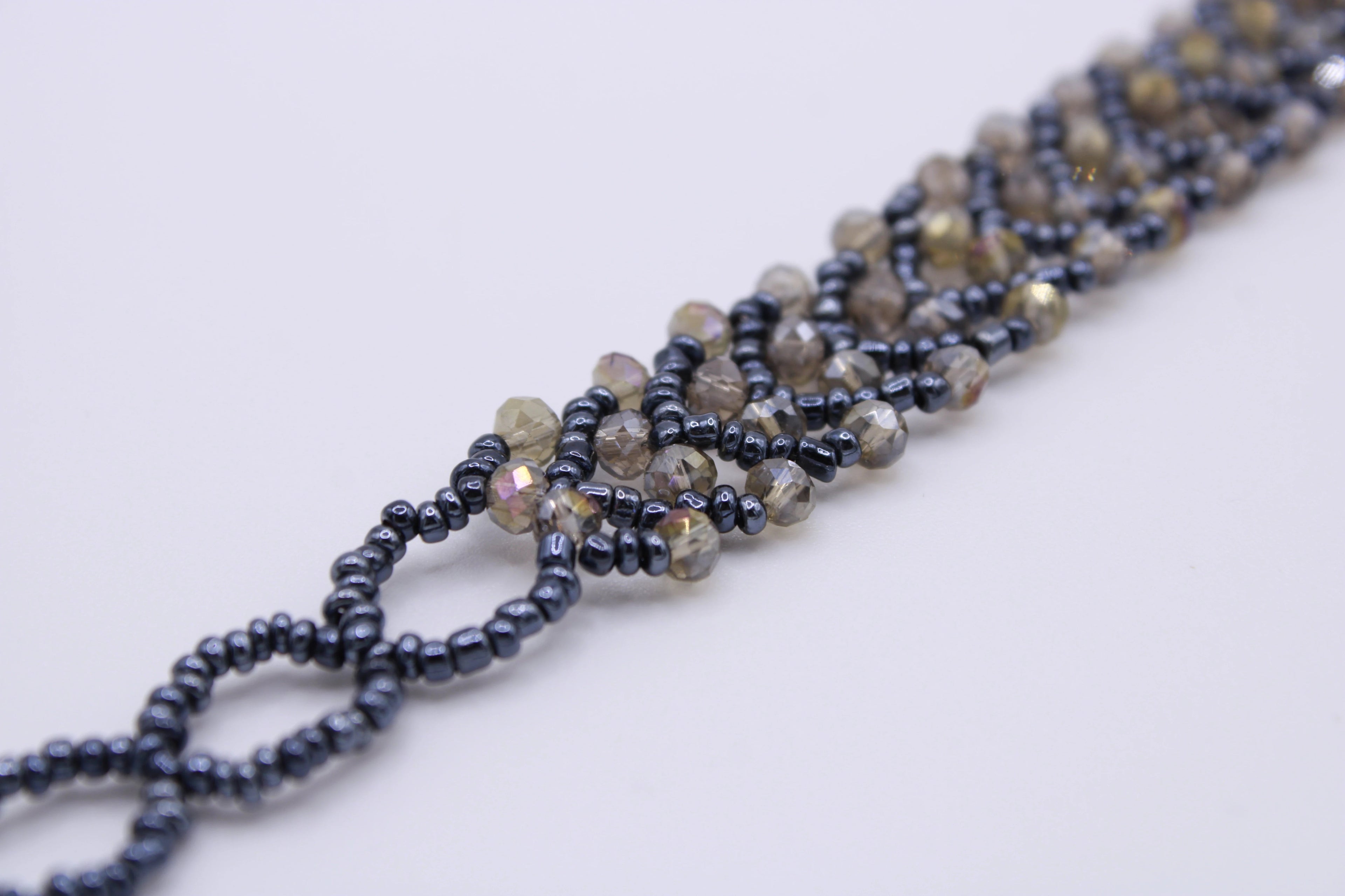 Bracciale Astra – Bracciale con cristalli intrecciati Surya