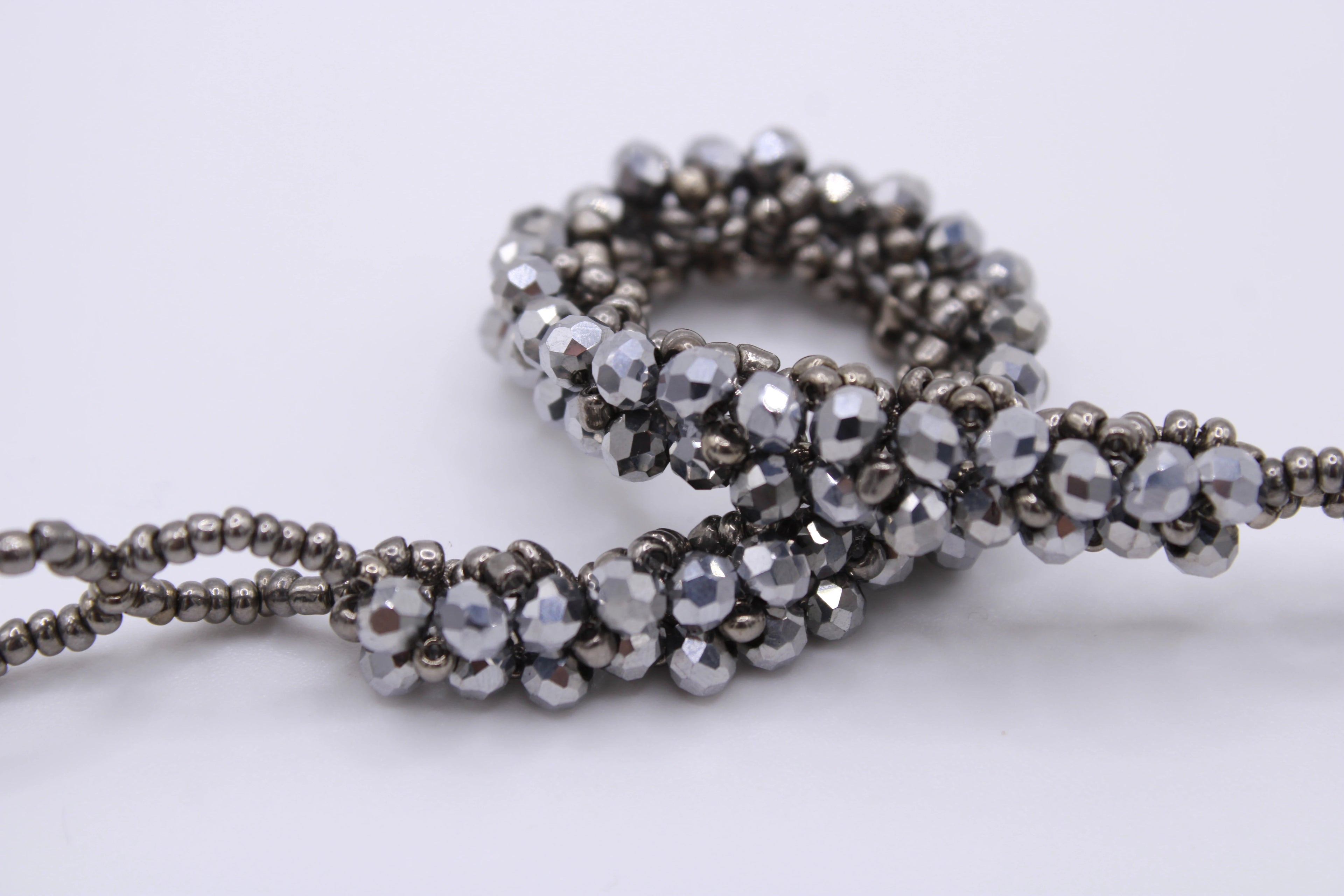 Bracciale Astra – Bracciale con cristalli intrecciati Surya