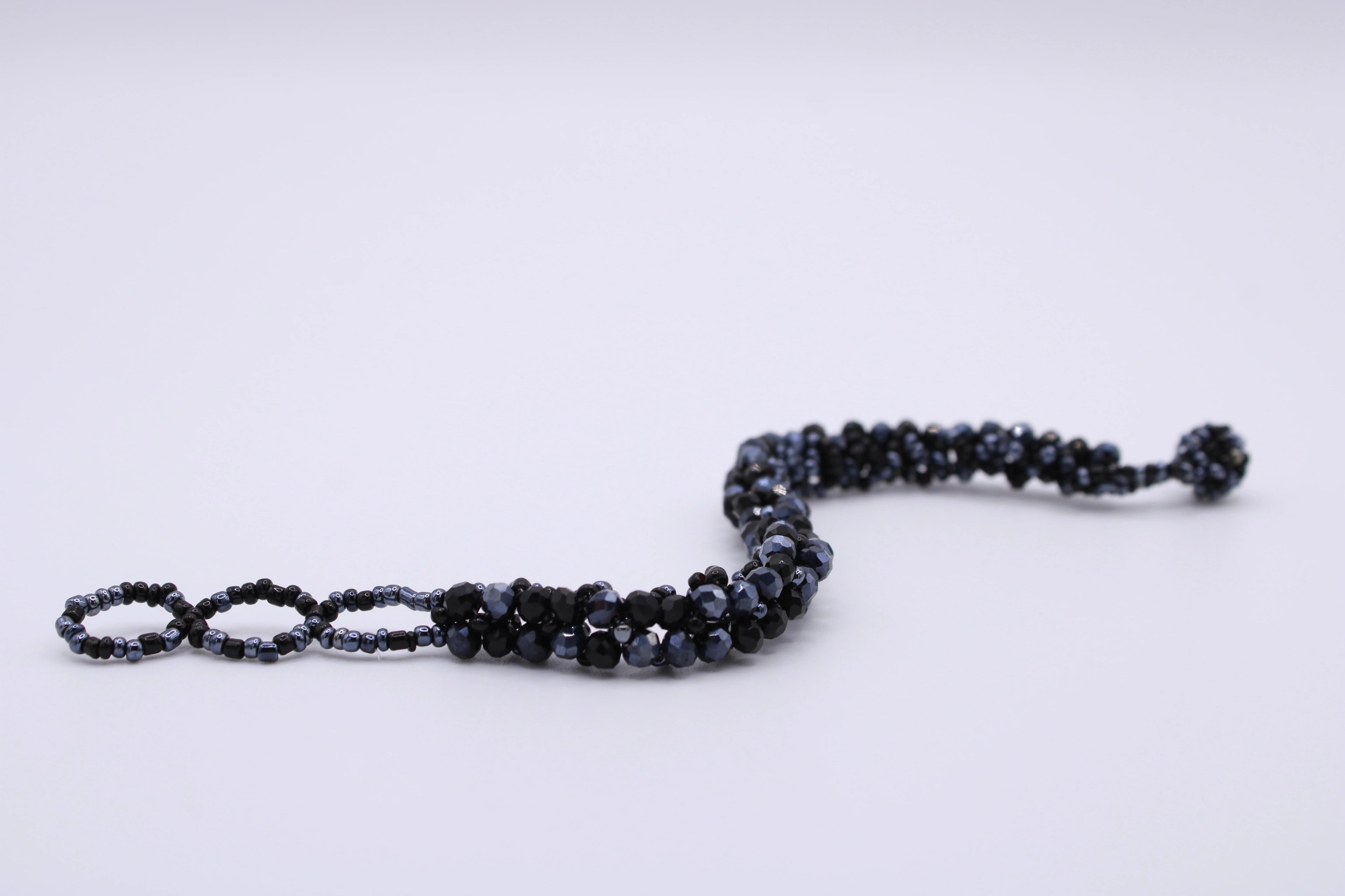 Bracciale Astra – Bracciale con cristalli intrecciati Surya
