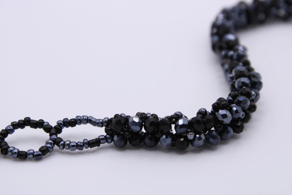 Bracciale Astra – Bracciale con cristalli intrecciati Surya