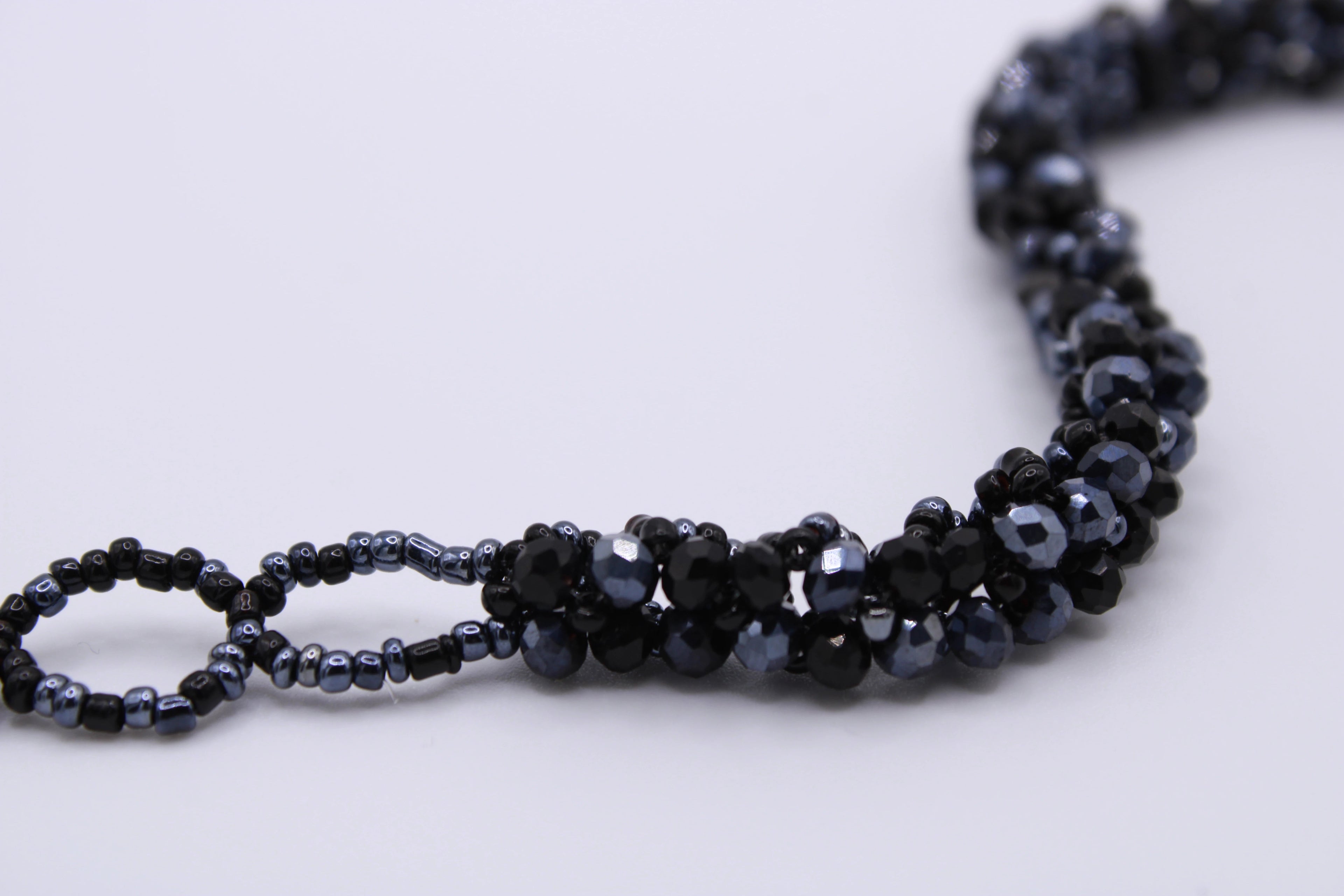Bracciale Astra – Bracciale con cristalli intrecciati Surya