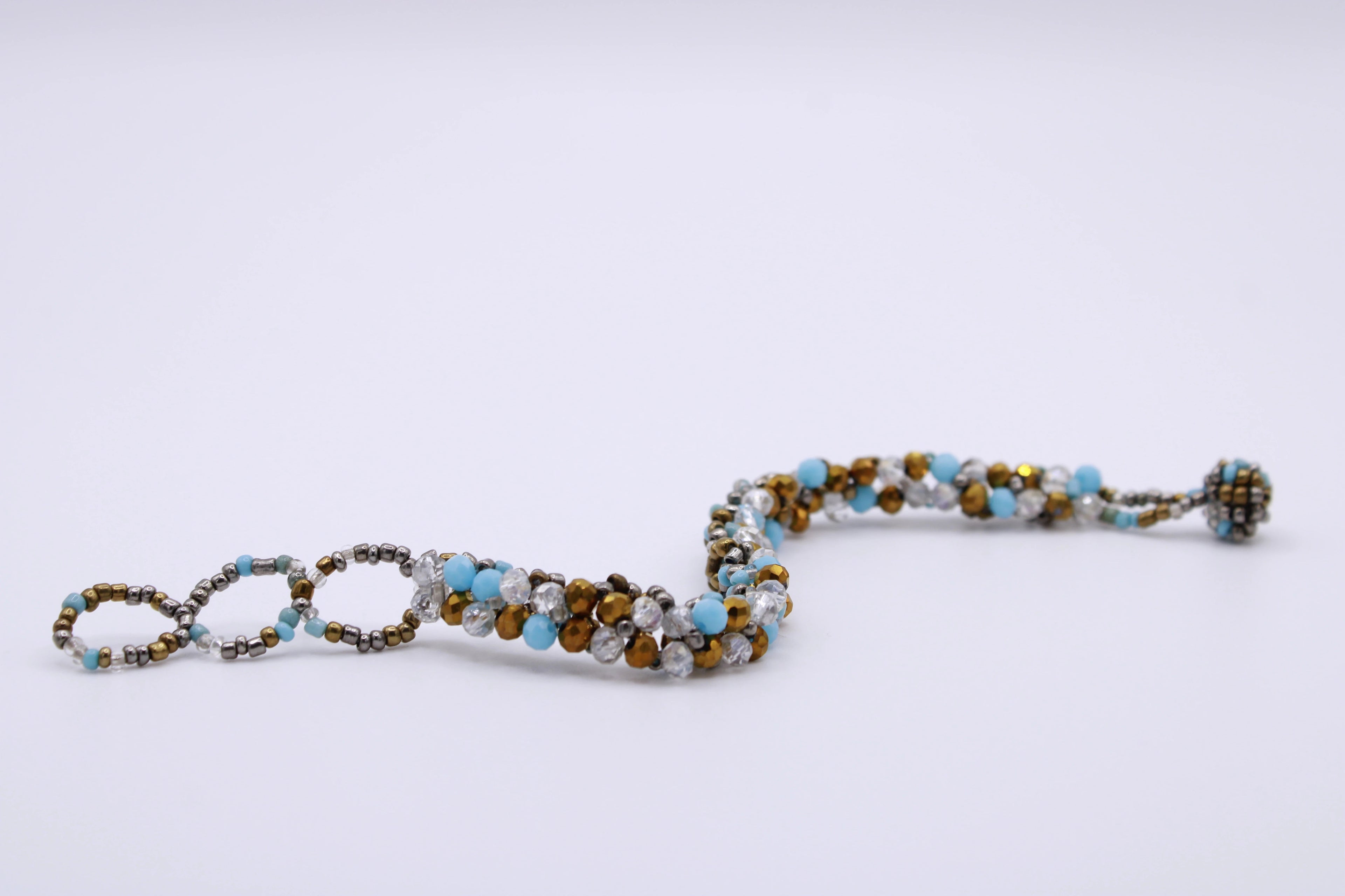 Bracciale Astra – Bracciale con cristalli intrecciati Surya
