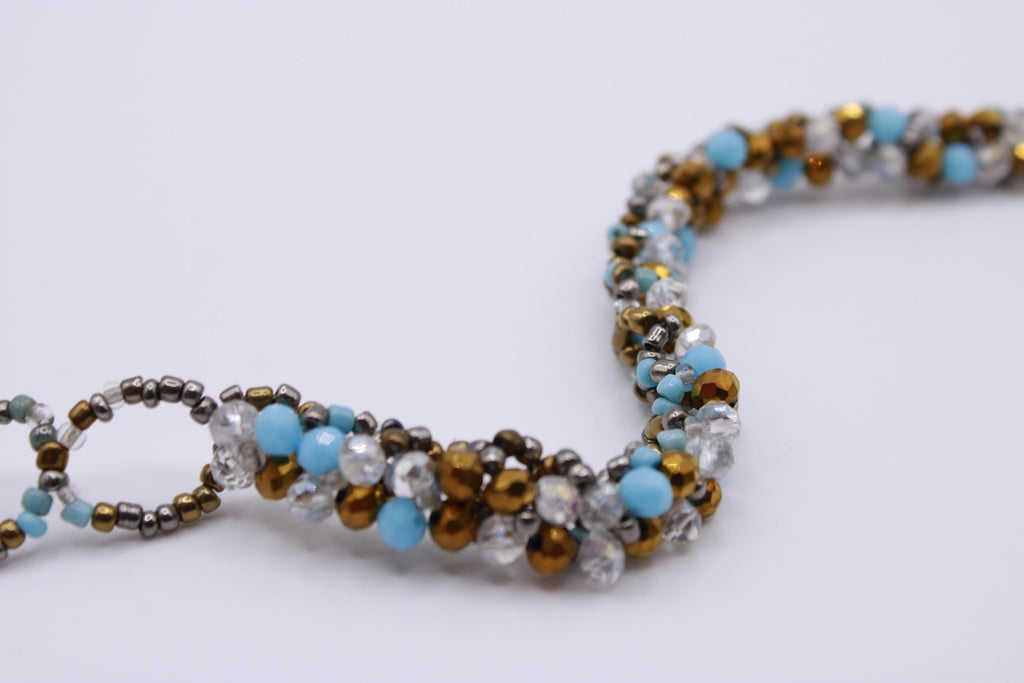 Bracciale Astra – Bracciale con cristalli intrecciati Surya