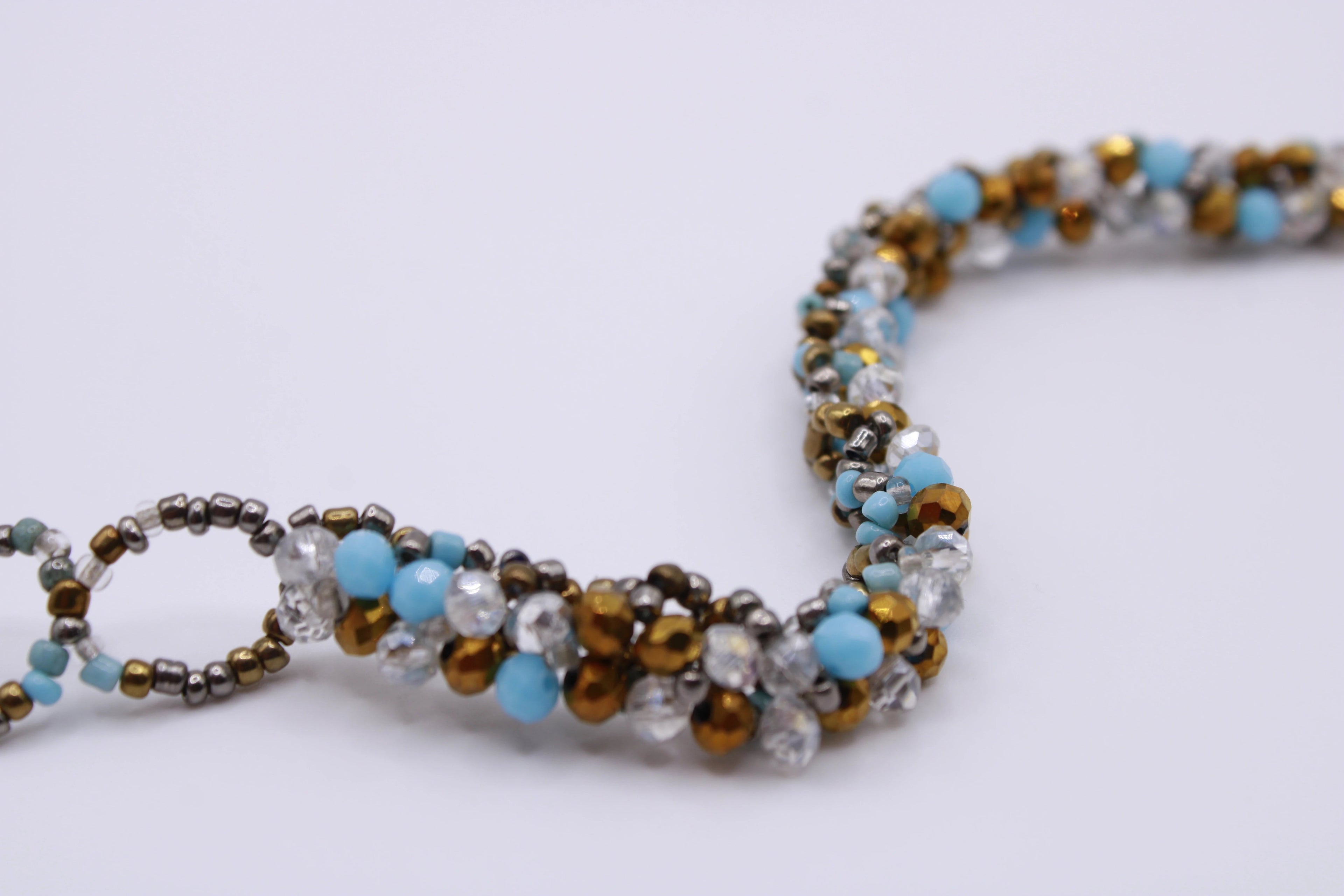 Bracciale Astra – Bracciale con cristalli intrecciati Surya