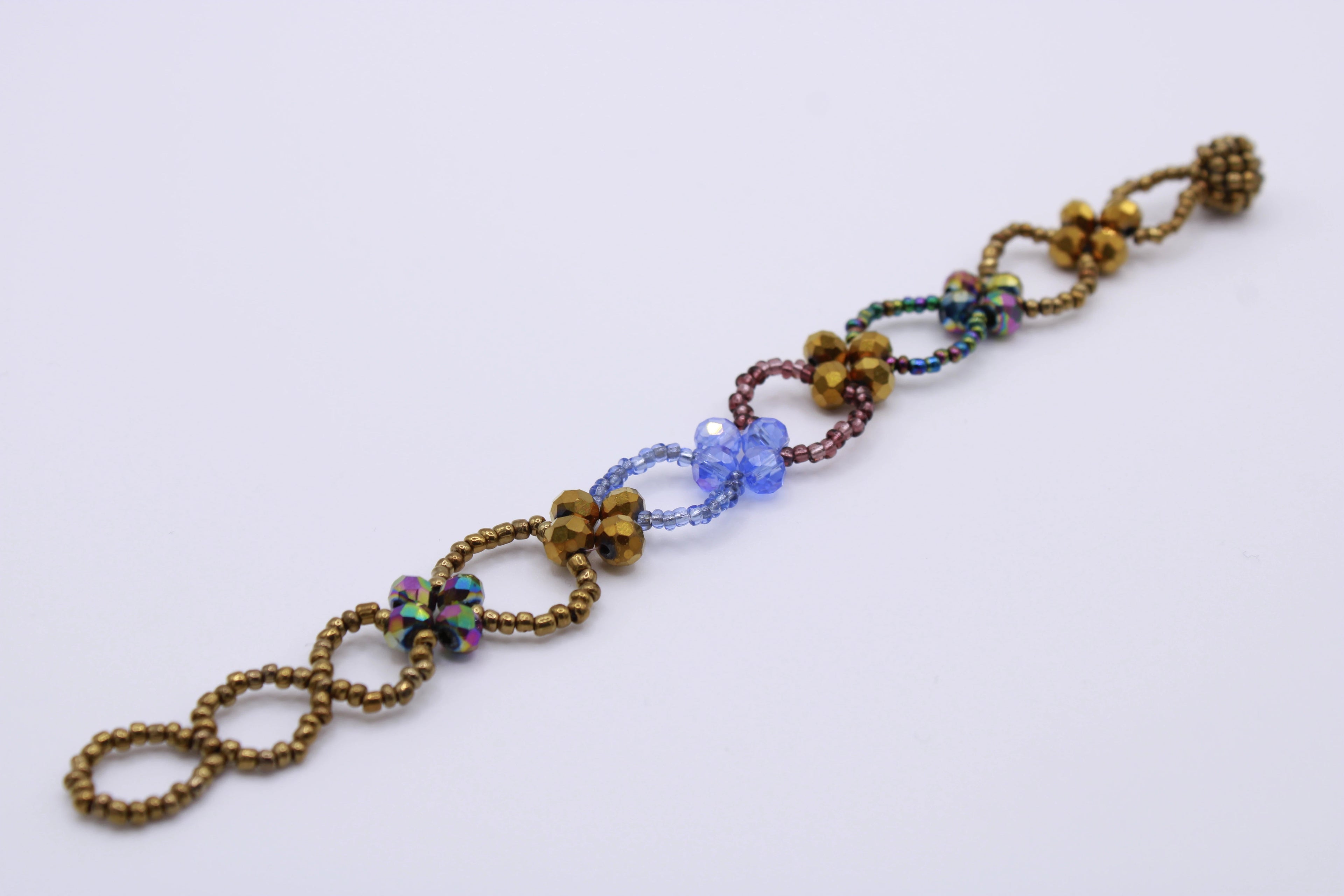 Bracciale Edoardo – Bracciale con cristalli a linea floreale Surya