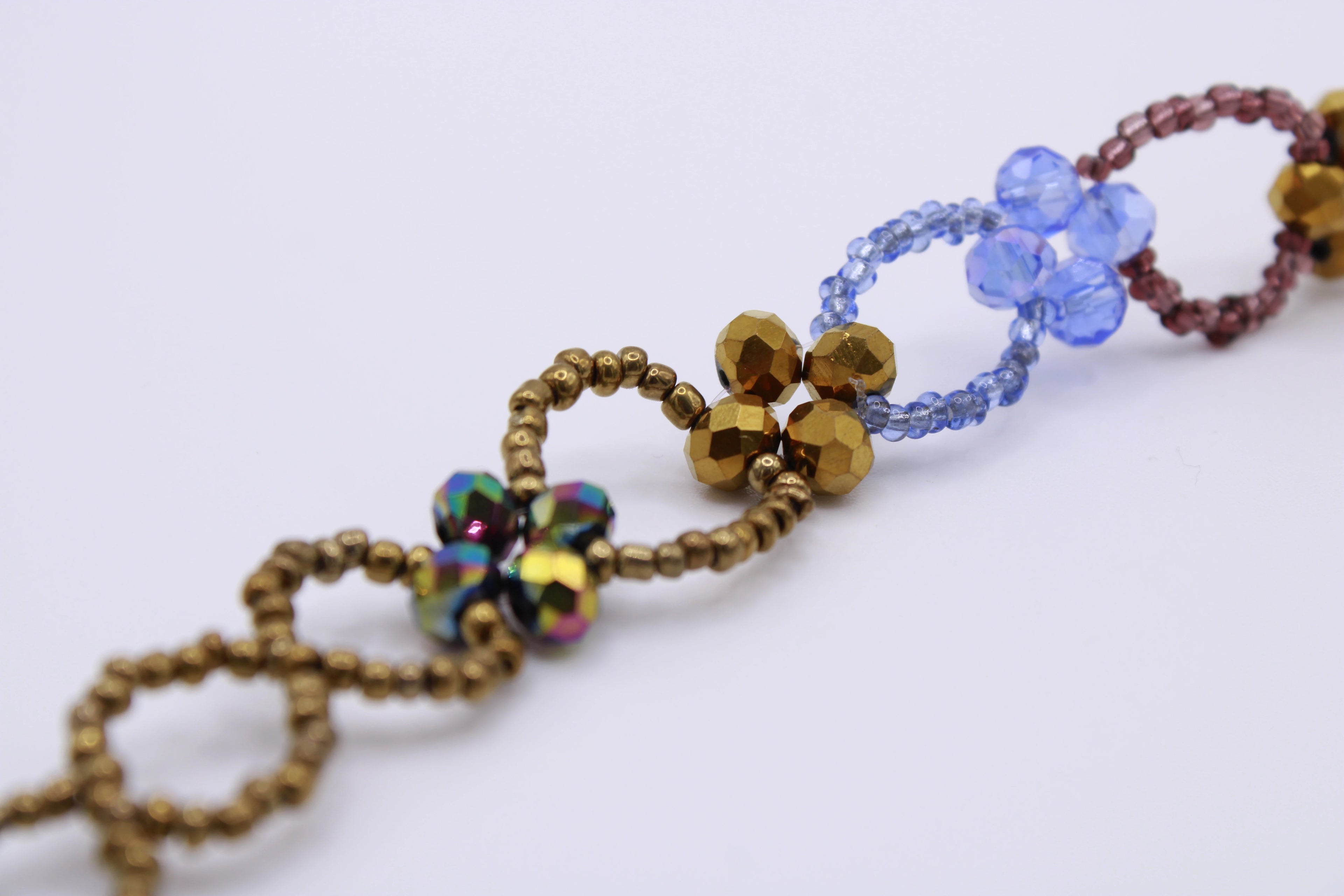 Bracciale Edoardo – Bracciale con cristalli a linea floreale Surya
