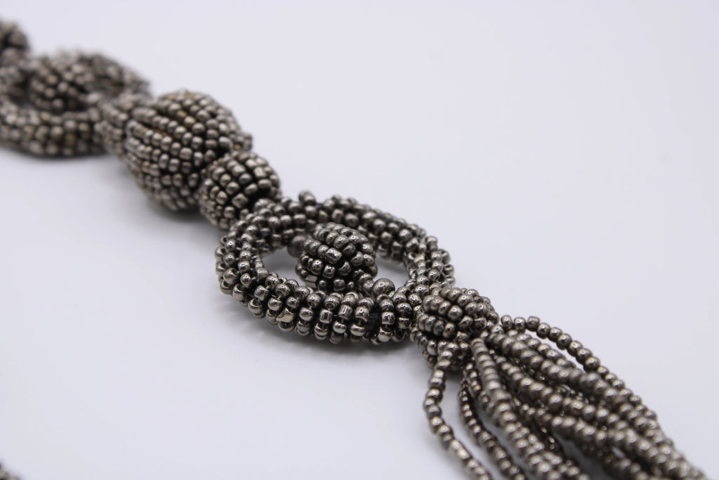Collana Legame – Collana in perline con elementi intrecciati Surya
