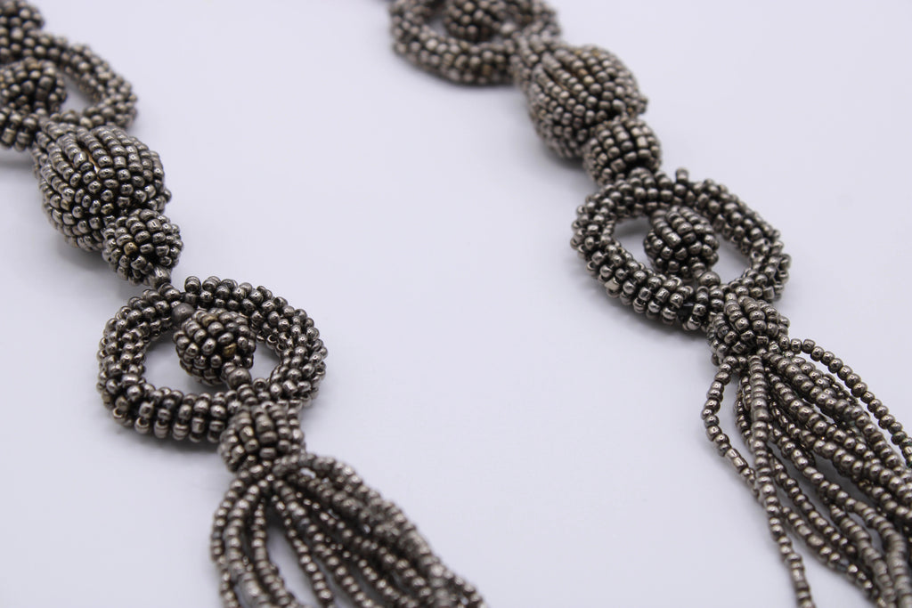 Collana Legame – Collana in perline con elementi intrecciati Surya
