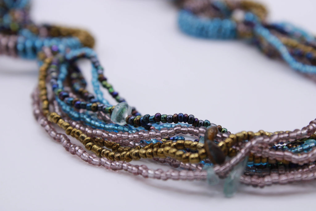 Collana Legame – Collana in perline con elementi intrecciati Surya
